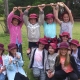 Tathra Public School students holding up a rake they have built by hand.