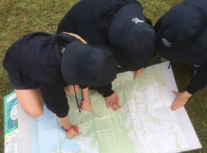 students reading maps